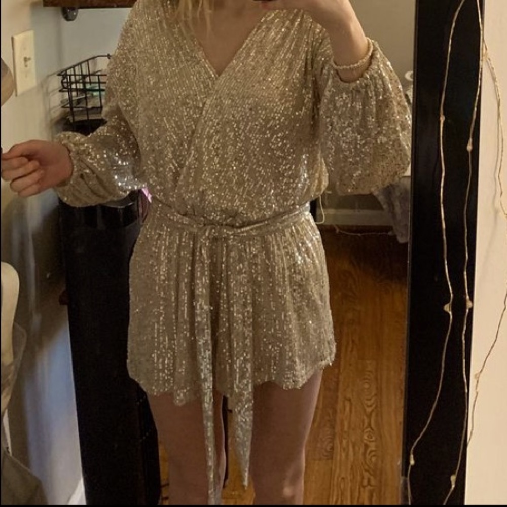 Champaign colored sequin romper with tie. Never worn